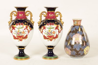 Lot 75 - A PAIR OF EARLY 20TH CENTURY 'H.M & CO' PORCELAIN VASES