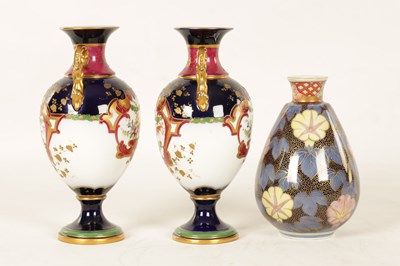 Lot 75 - A PAIR OF EARLY 20TH CENTURY 'H.M & CO' PORCELAIN VASES