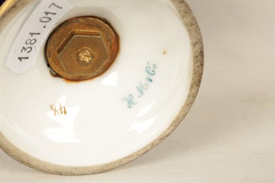 Lot 75 - A PAIR OF EARLY 20TH CENTURY 'H.M & CO' PORCELAIN VASES