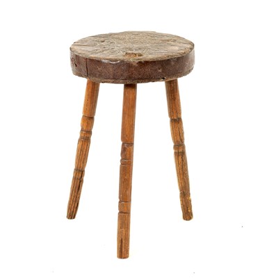 Lot 1166 - A 18TH CENTURY PRIMITIVE ELM STOOL