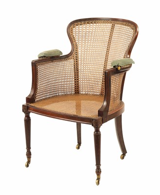 Lot 1369 - AN UNUSUAL REGENCY MAHOGANY HEPPLEWHITE STYLE BERGERE LIBRARY CHAIR