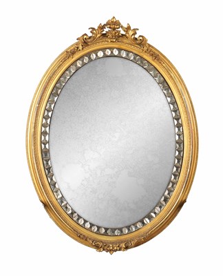 Lot 1181 - A 19TH CENTURY IRISH GILT GESSO AND MOSAIC MIRRORED GLASS OVAL HANGING MIRROR