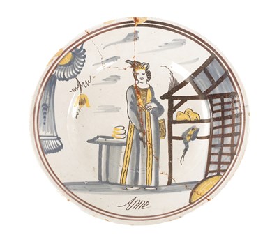 Lot 29 - A LATE 19TH CENTURY POLYCHROME PAINTED SHALLOW POTTERY DISH