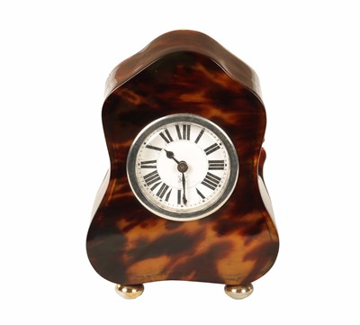 Lot 1003 - AN EDWARDIAN TORTOISESHELL BOUDOIR CLOCK