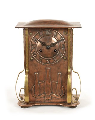 Lot 652 - AN ARTS AND CRAFT COPPER AND BRASS MANTEL CLOCK
