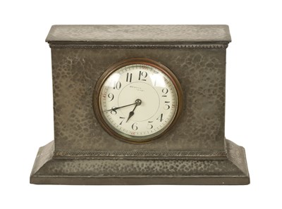 Lot 1727 - LIBERTY & CO. AN ARTS AND CRAFTS ENGLISH PEWTER MANTEL CLOCK