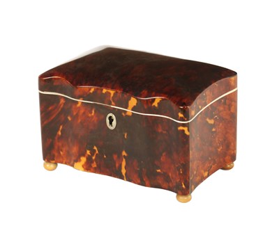Lot 1135 - A 19TH CENTURY TORTOISESHELL AND IVORY SERPENTINE SHAPED TEA CADDY