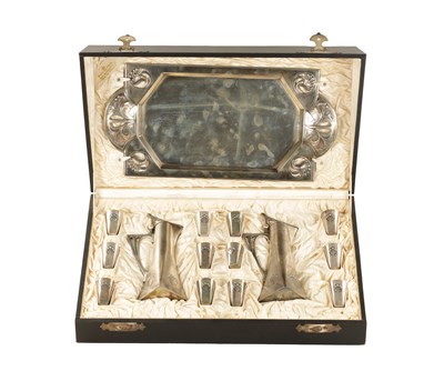 Lot 872 - AN ART DECO W M F PEWTER CASED LIQUOR SET
