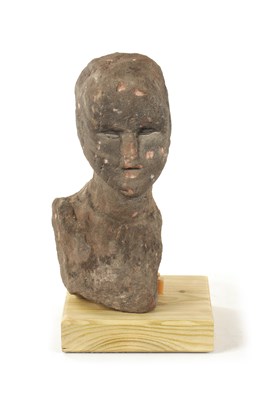 Lot 695 - AN EARLY CELTIC RED SANDSTONE HEAD POSSIBLY 1ST TO 3RD CENTURY