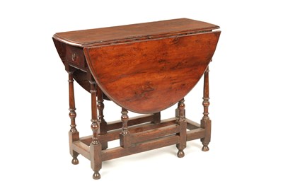 Lot 1315 - A RARE 17TH CENTURY YEW-WOOD AND ELM GATE-LEG TABLE