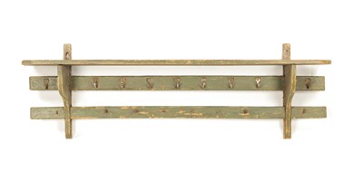Lot 1187 - AN 18TH CENTURY PAINTED GREEN HANGING PAN RACK