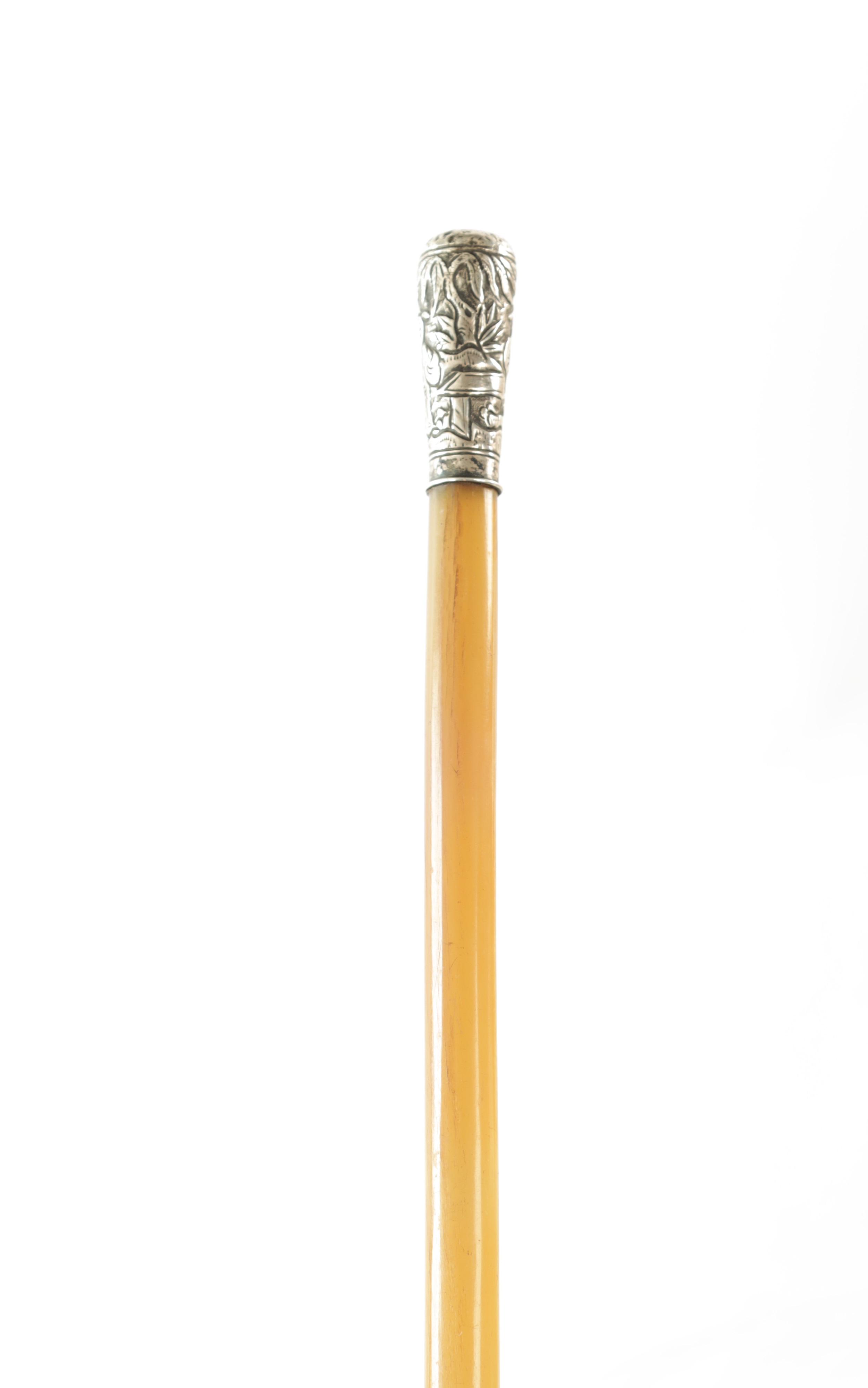 Honey-coloured antique walking cane with decorative metal mount sold by Hutchinson Scott