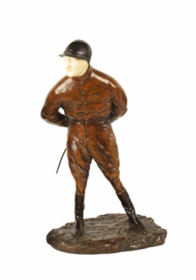 Lot 705 - P.E.GOUREAU (Fl. EARLY 20TH CENTURY) A PATINATED BRONZE AND IVORY SCULPTURE