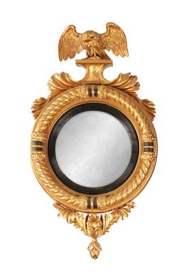 Lot 1219 - A REGENCY GILT CARVED WOOD CONVEX HANGING MIRROR