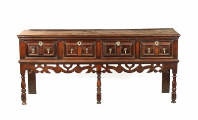 Lot 1252 - A WILLIAM AND MARY OAK MOULDED FRONT DRESSER BASE