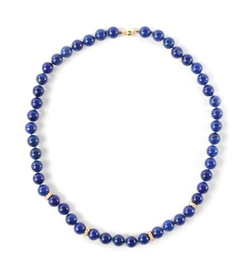 Lot 335 - A LAPIS LAZULI BEAD NECKLACE SET WITH FOUR DIAMOND NARROW BANDS