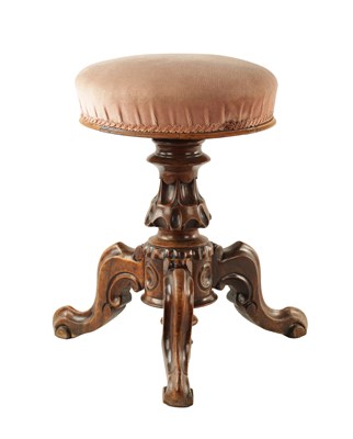 Lot 1375 - AN EARLY VICTORIAN CARVED WALNUT REVOLVING PIANO STOOL