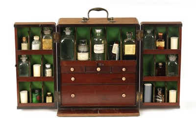 Lot 1165 - A GEORGE III MAHOGANY APOTHECARIES CABINET