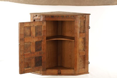 Lot 1100 - A FINE EARLY THOMAS 'GNOME MAN' WHITTAKER LIGHTLY ADZED AND BURR OAK HANGING CORNER CUPBOARD OF SMALL SIZE - IN THE MANNER OF ROBERT 'MOUSEMAN' THOMPSON