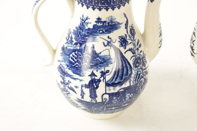 Lot 82 - TWO SIMILAR 18TH-CENTURY BLUE AND WHITE WORCESTER TYPE COFFEE POTS AND COVERS