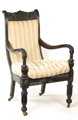 Lot 1341 - AN EARLY 19TH CENTURY SRI LANKAN / CEYLONESE SOLID EBONY BERGERE ARMCHAIR