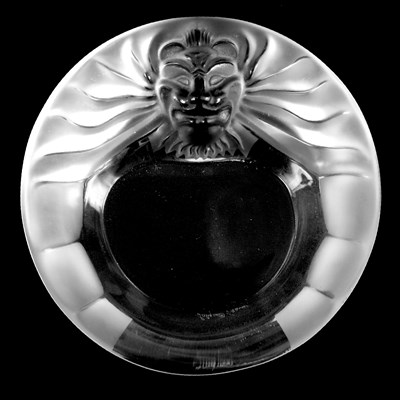 Lot 25 - A LALIQUE LIONS HEAD GLASS CIRCULAR PIN TRAY...