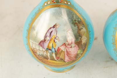 Lot 35 - A PAIR OF 19TH CENTURY FRENCH SERVES PORCELAIN VASES