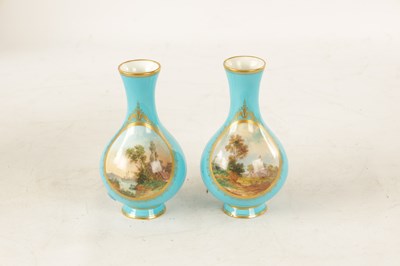 Lot 35 - A PAIR OF 19TH CENTURY FRENCH SERVES PORCELAIN VASES