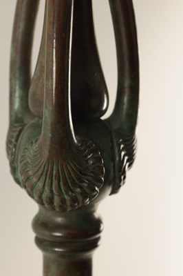 Lot 725 - TIFFANY & CO. NEW YORK. A LARGE STYLISH ART NOUVEAU GREEN PATINATED BRONZE TELESCOPIC AND STAINED GLASS TABLE LAMP