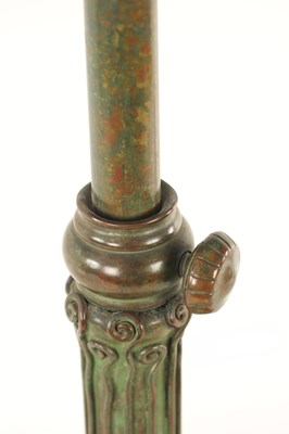 Lot 725 - TIFFANY & CO. NEW YORK. A LARGE STYLISH ART NOUVEAU GREEN PATINATED BRONZE TELESCOPIC AND STAINED GLASS TABLE LAMP