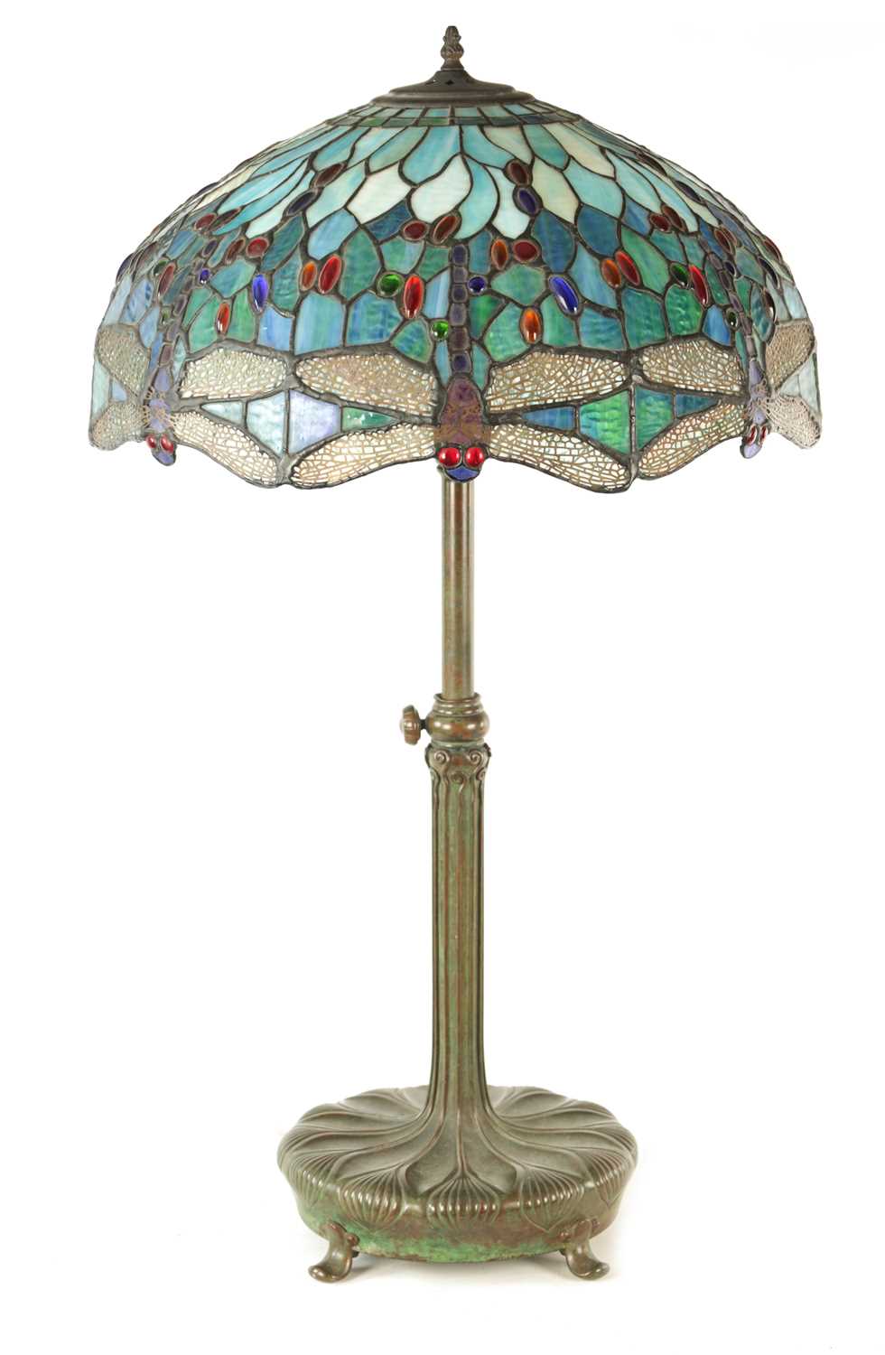 Lot 725 - TIFFANY & CO. NEW YORK. A LARGE STYLISH ART NOUVEAU GREEN PATINATED BRONZE TELESCOPIC AND STAINED GLASS TABLE LAMP