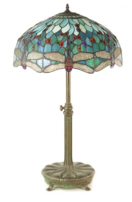 Lot 725 - TIFFANY & CO. NEW YORK. A LARGE STYLISH ART NOUVEAU GREEN PATINATED BRONZE TELESCOPIC AND STAINED GLASS TABLE LAMP