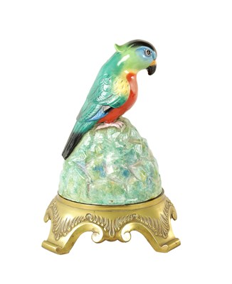 Lot 754 - AN EARLY 20TH CENTURY ROYAL DOULTON ARTANDIA SPEAKER COVER MODELLED AS A PARROT