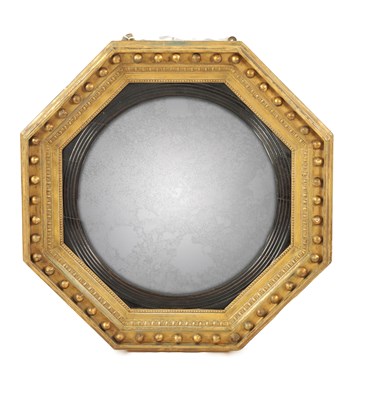 Lot 1368 - A REGENCY OCTAGONAL GILT FRAMED CONVEX MIRROR