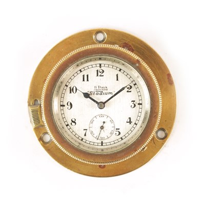 Lot 23 - AN EARLY 20TH CENTURY STADIUM 8-DAY BRASS CASED CAR CLOCK
