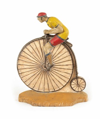 Lot 81 - A RARE 19TH CENTURY CAST IRON PAINTED DOORSTOP FORMED AS A CYCLIST MOUNTED ON A PENNY FARTHING