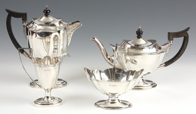 Lot 300 - A FOUR PIECE SILVER TEA SERVICE of slender...
