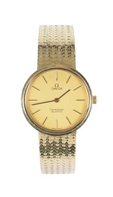 Lot 219 - A 9CT GOLD OMEGA CONSTELLATION GENTLEMANS QUARTZ WRISTWATCH ON A MILANESE STYLE BRACELET WITH LADDER CLASP