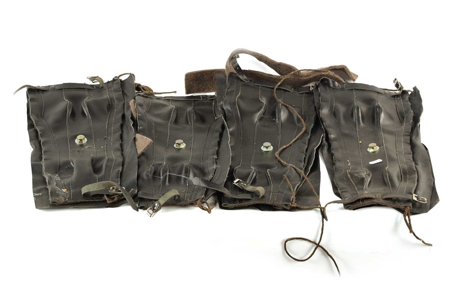 Lot 34 - A SET OF FOUR UNUSED LEATHER WEFCO SPRING GAITERS