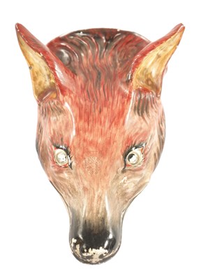 Lot 52 - A LATE 19TH CENTURY CERAMIC FOX HEAD STIRRUP CUP