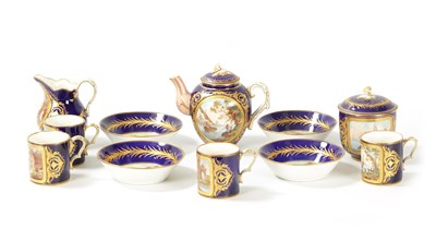 Lot 64 - A FINE 18TH CENTURY SEVRES RICHLY GILT AND ROYAL BLUE GROUND ELEVEN-PIECE CABINET SERVICE