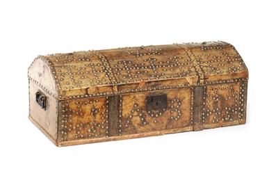 Lot 1485 - A 17TH CENTURY DOME TOP STUDDED LEATHER TRUNK