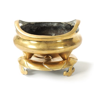 Lot 97 - AN EARLY CHINESE CAST BRONZE CENSOR WITH STAND