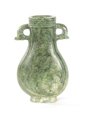 Lot 98 - A LARGE CHINESE SPINACH-GREEN JADE TWO-HANDLED VASE