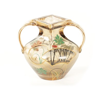 Lot 7 - EMILE GALLE. A LATE 19TH CENTURY SMOKED GLASS TWO-HANDLED VASE