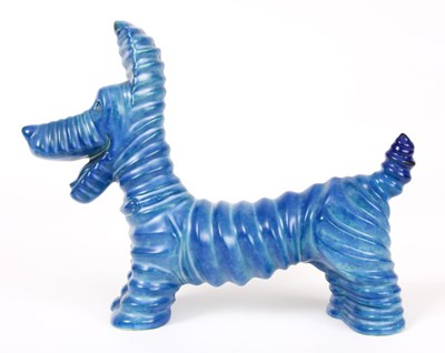Lot 39 - A CARLTONWARE RIBBED PORCELAIN COMICAL DOG...