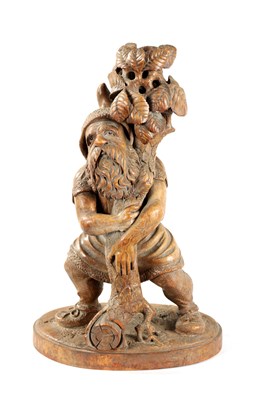 Lot 382 - A 19TH CENTURY BLACK FOREST CARVED LINDEN WOOD FIGURE
