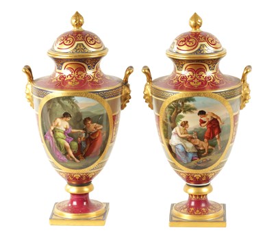 Lot 61 - A FINE PAIR OF VIENNA PORCELAIN URN SHAPED LIDDED VASES
