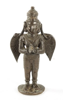 Lot 142 - AN EARLY INDIAN CAST BRONZE FIGURE OF A HINDU DEITY