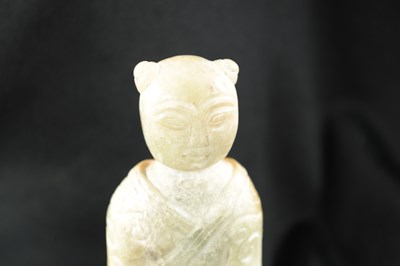 Lot 501 - A CHINESE CARVED JADE RELIGIOUS FIGURE